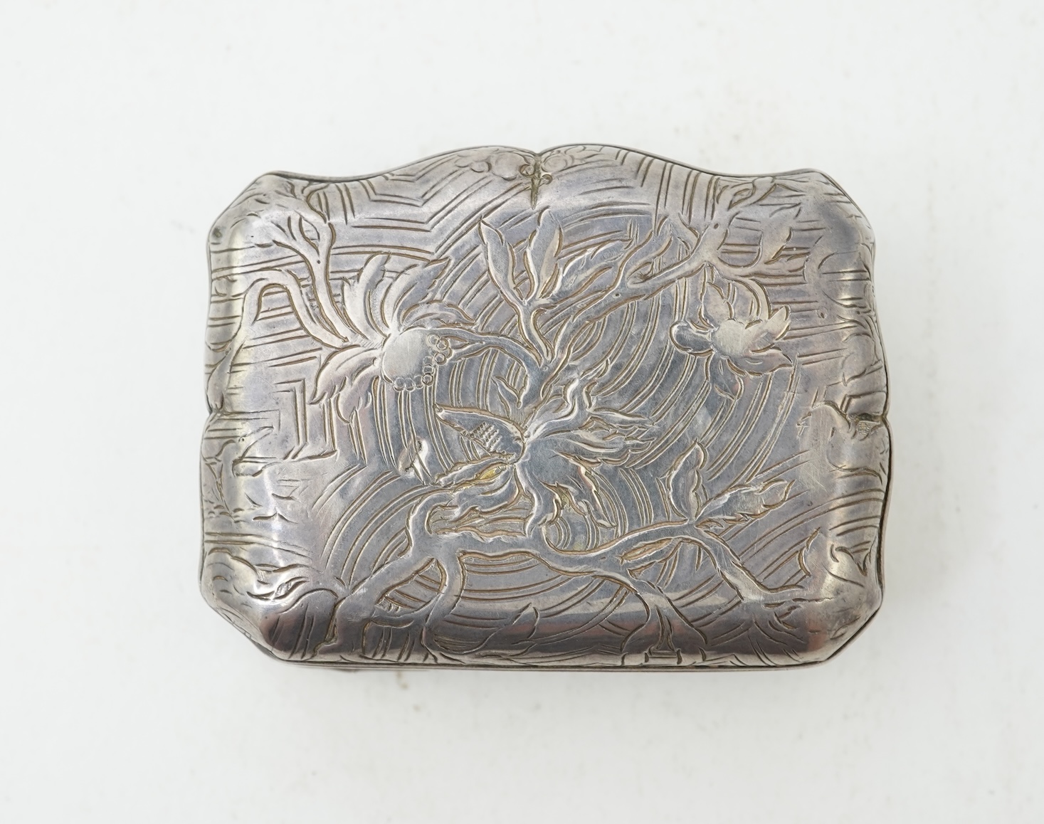 An early 19th century French white metal snuff box, with hinged cover